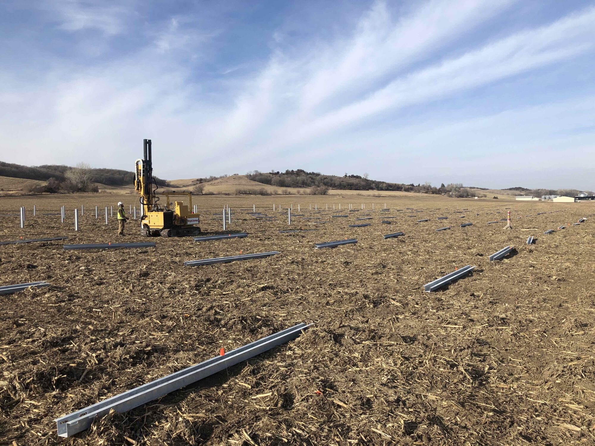 A field where solar-plus-storage project is being constructed
